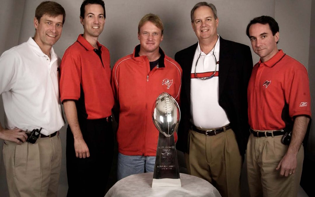 Picture of Nathan Whitaker and Tampa Bay coaching staff with Lombardi Trophy after winning Super Bowl XXXVII