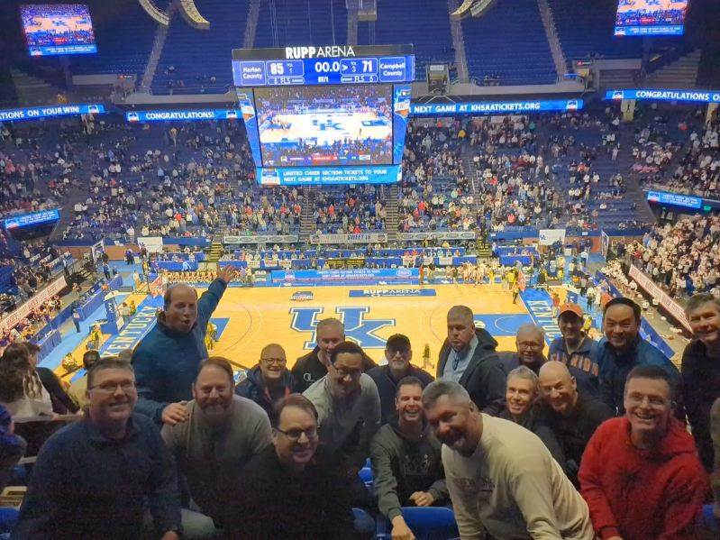 Members of the author's fantasy baseball team watch high school basketball at Rupp Arena at the University of Kentucky
